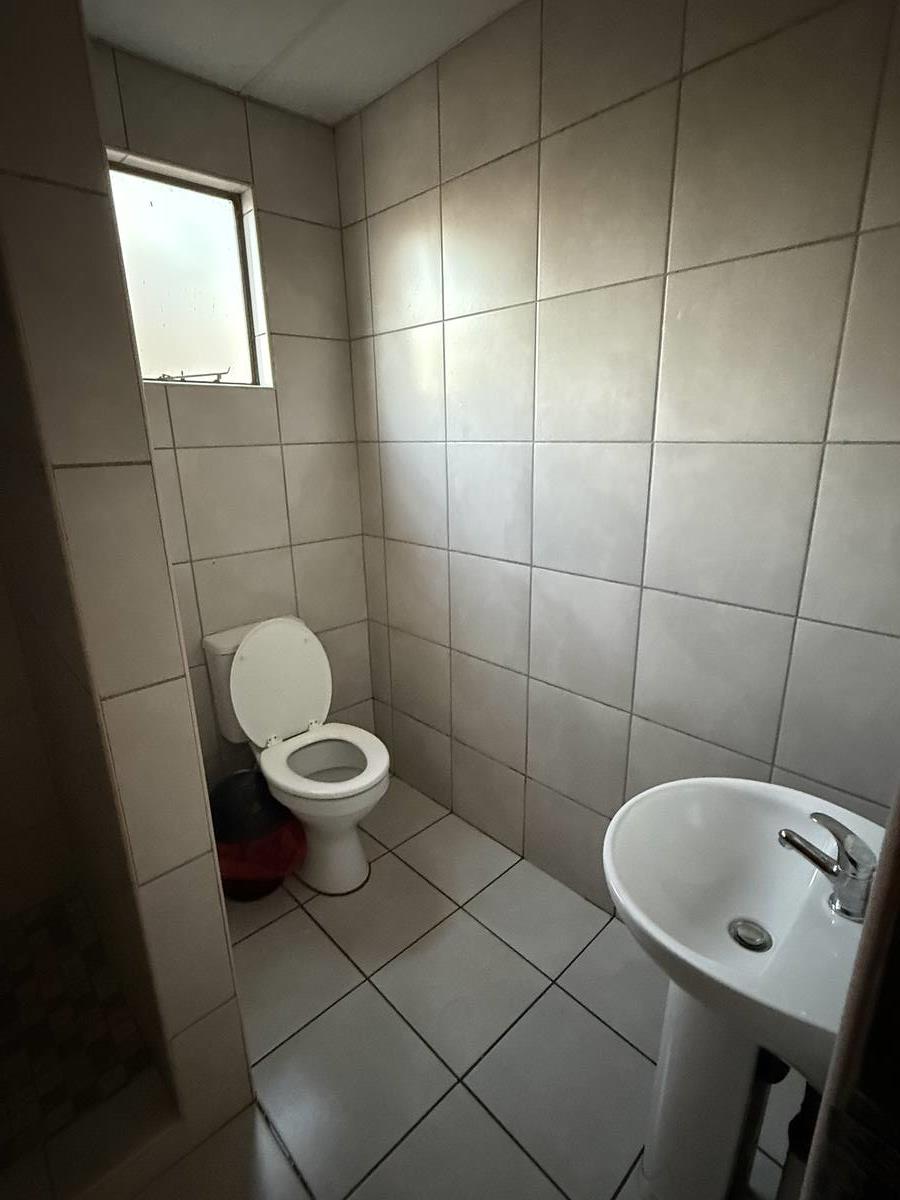 Bathroom — shower and toilet